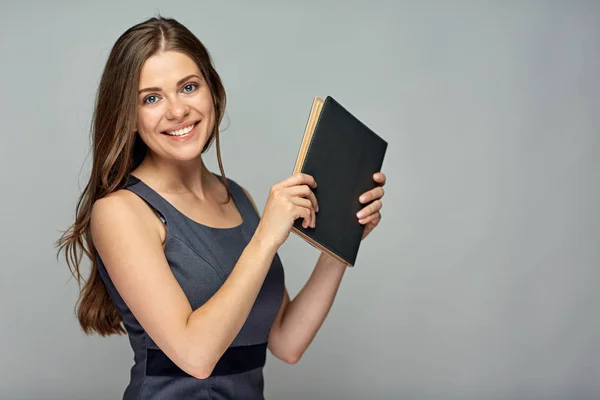 Smiling school teacher holding book. — Stock Photo, Image