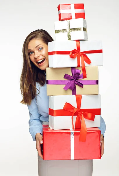 Business woman in santa hat holding boxes — стоковое фото