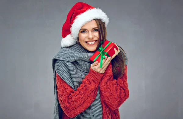 Smiling Woman Santa Hat Warm Clothes Scarf Holding Christmas Gift — Stock Photo, Image