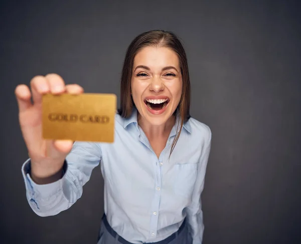 Woman with open mouth holding card — Stock Photo, Image