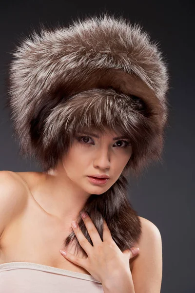 Attractive Young Woman Wearing Fur Hat Looking Camera Gray Background — Stock Photo, Image