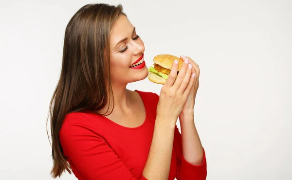 Mujer Feliz Con Labios Rojos Sosteniendo Hamburguesa Sobre Fondo Claro —  Fotos de Stock