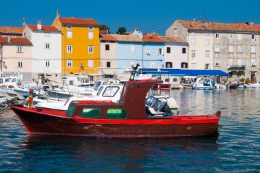 Cres old town with boat clipart