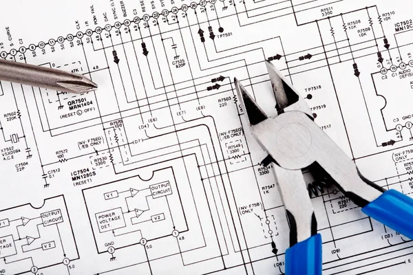 Tools on schematic diagram — Stock Photo, Image