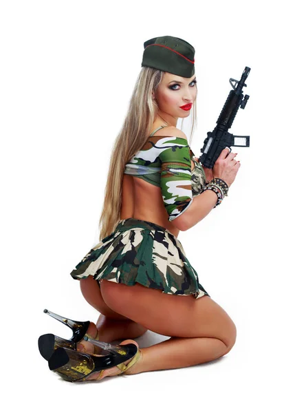 Tanečnice, oblečený jako voják — Stock fotografie