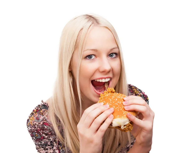 Burger yiyen kadın — Stok fotoğraf