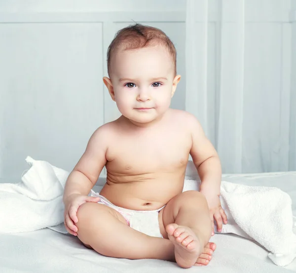 Baby with a towel — Stock Photo, Image