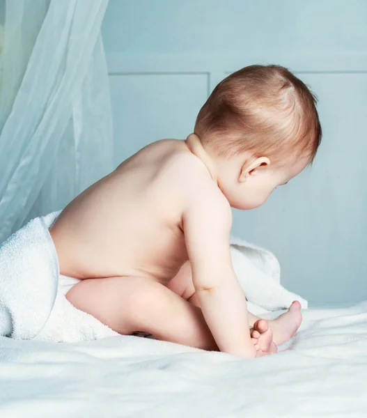 Baby with a towel — Stock Photo, Image