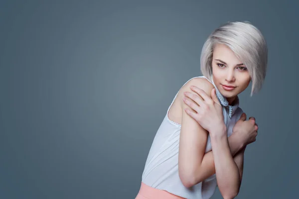 Blond woman with brown eyes — Stock Photo, Image