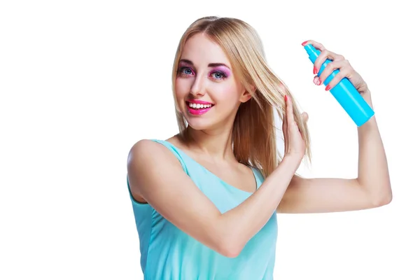 Femme avec un spray capillaire — Photo