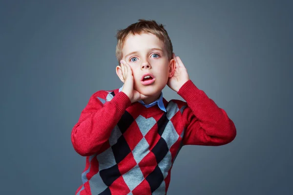 Surpsied listening boy — Stock Photo, Image