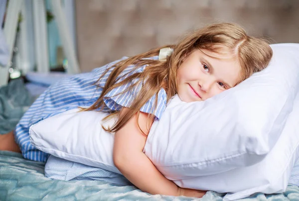 Girl with a pillow — Stock Photo, Image