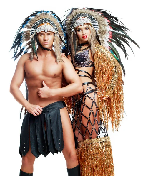 Striptease dancers wearing  Native American costumes — Stock Photo, Image
