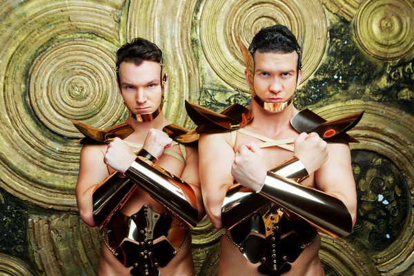 Dancers dressed as warriors  in the studio — Stock Photo, Image
