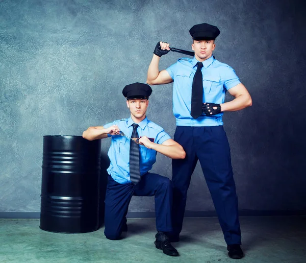 Striptease dancers  policemen — Stock Photo, Image