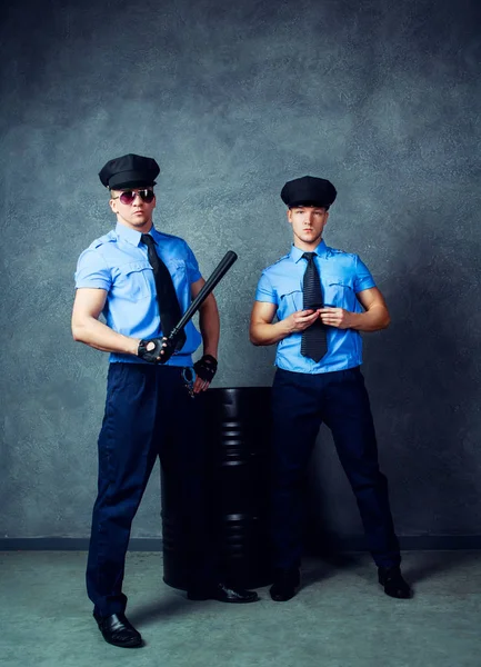 Striptease dancers policemen — Stock Photo, Image