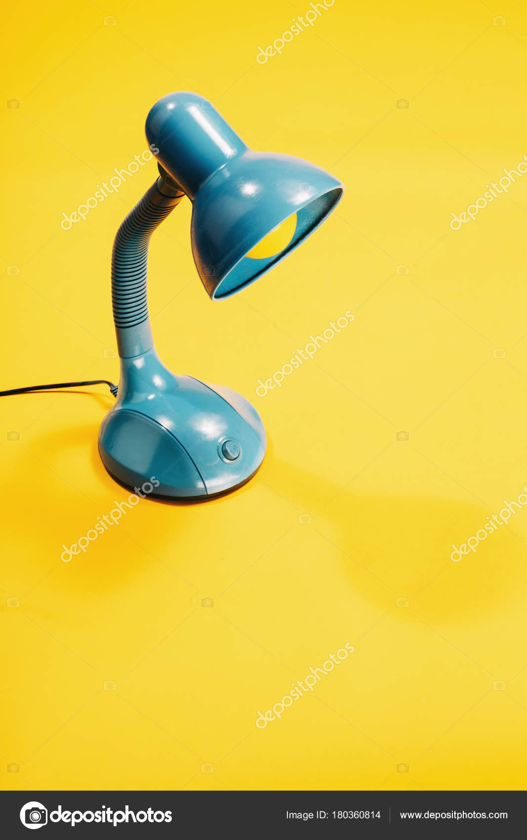 Blue Desk Lamp Yellow Light Bulb Standing Background Stock Blue Desk Lamp With Yellow Light Bulb Standing On A Background Photo By Photocreo