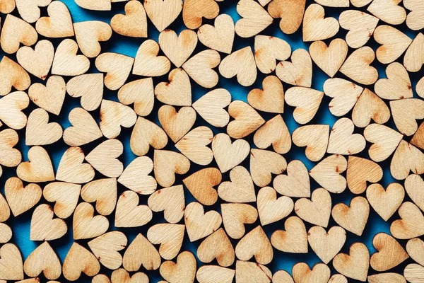 Little Wooden Hearts Layered Tightly Blue Background Love Concept Valentine — Stock Photo, Image