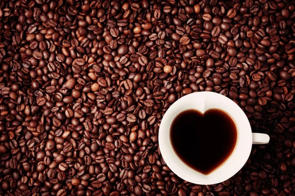 Copa de café en forma de corazón —  Fotos de Stock