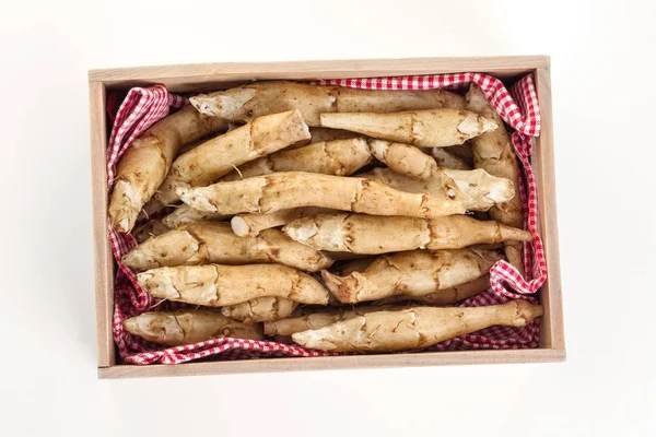 Raw topinambour in box — Stock Photo, Image