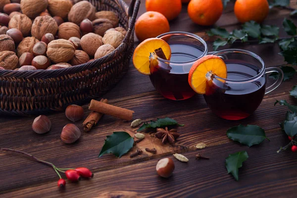 Christmas mulled wine with spices wooden background — Stock Photo, Image