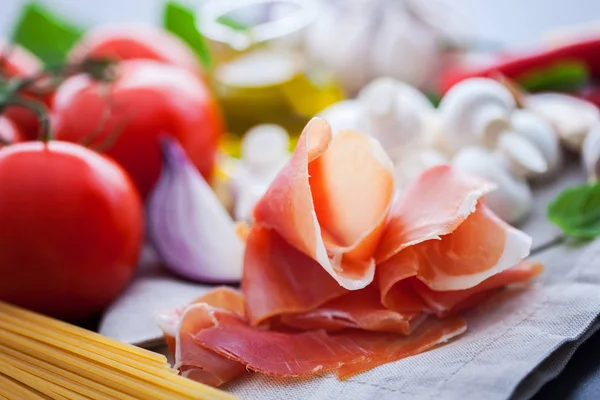 Prosciutto di Parma and italian ingredients — Stock Photo, Image