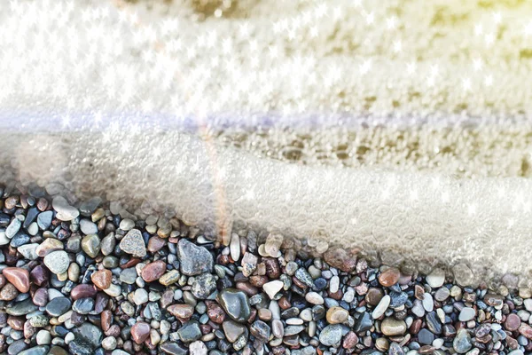 Abstracte achtergrond met pebbles - ronde zee stenen gewassen door de zee-Golf. — Stockfoto