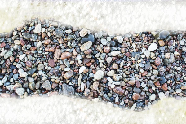 Fondo abstracto con guijarros - piedras redondas lavadas por la ola marina . — Foto de Stock