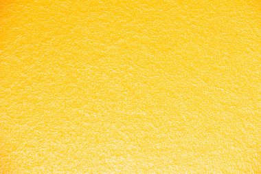 Arka plan için yakın plan sarı doku. Aşağıdan gelen ışık