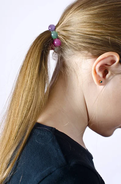 Young girl combing Golden hair — Stock Photo, Image