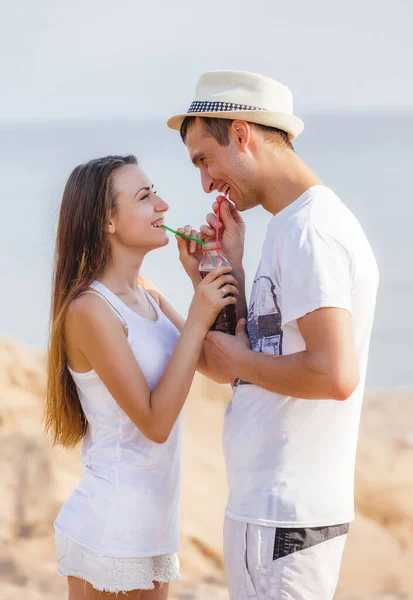 Happy Couple Sea Young Man Girl Drinking Juice Straw One — Stock Photo, Image