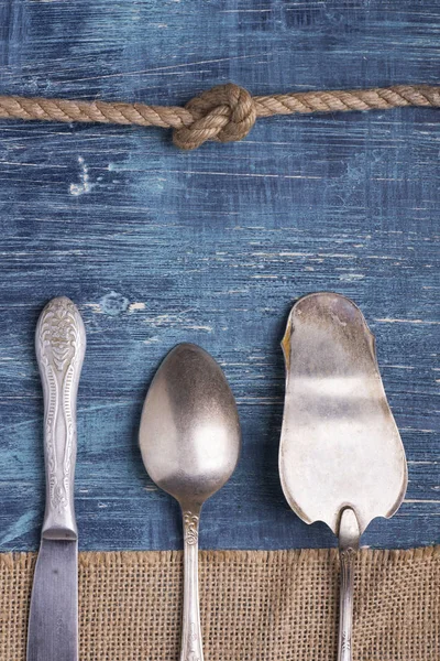 Utensílios de cozinha em fundo texturizado — Fotografia de Stock