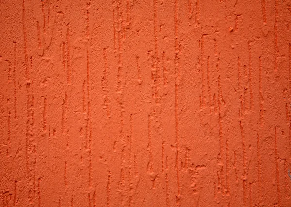 Surface of a wall of orange colour