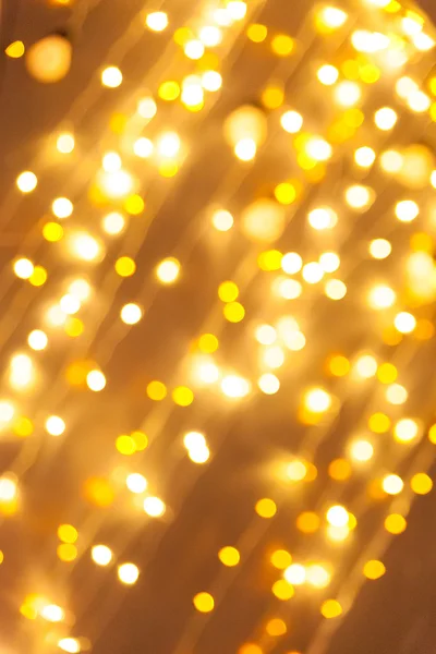 Christmas background with golden bokeh lights — Stock Photo, Image