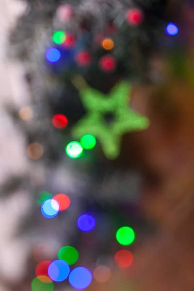 Bokeh ışıkları ve yıldızlarıyla Noel arkaplanı — Stok fotoğraf
