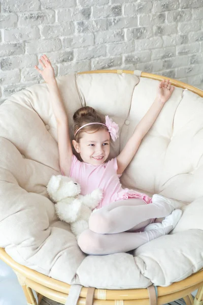 Little ballerina in a studio