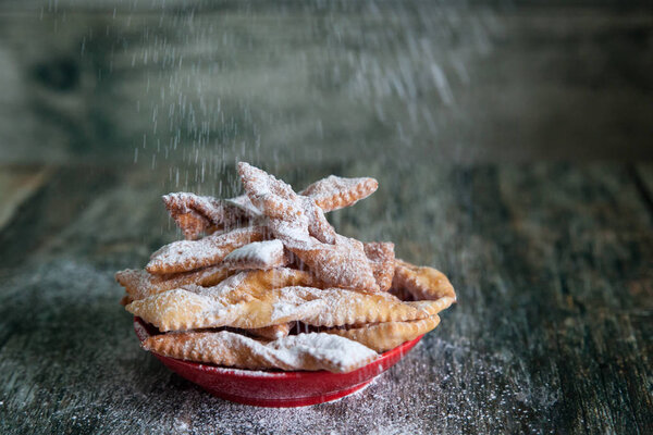 Crispy cookies Brushwood with powdered sugar
