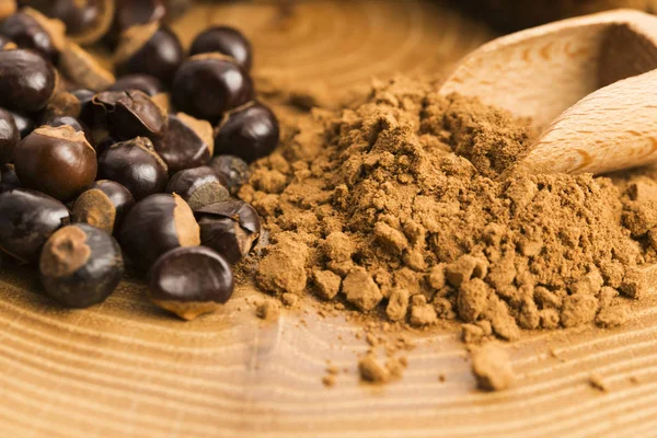Guarana seeds and powder — Stock Photo, Image