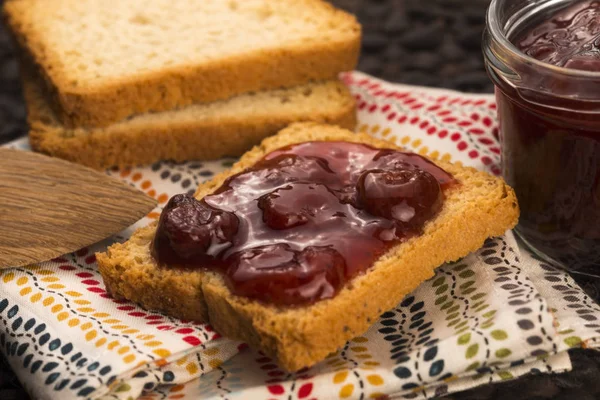 Breakfast of cherry jam on toast Royalty Free Stock Photos