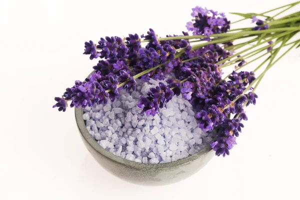 Lavender bath salt and some fresh lavender Stock Picture