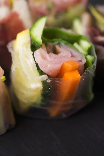 Japanese Salad Roll on black plate