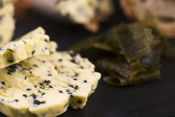 Herbs butter with wamake and sesame — Stock Photo, Image