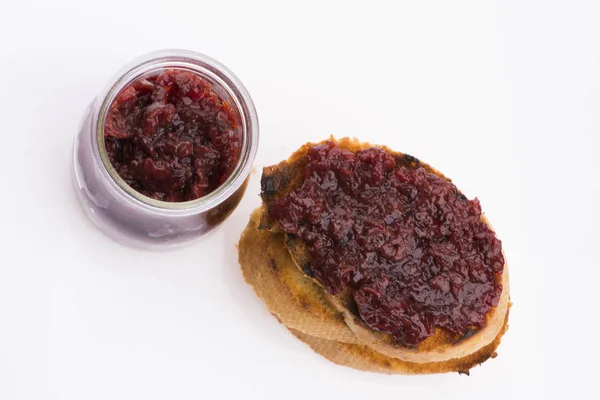 Bread with sweet cherry jam — Stockfoto