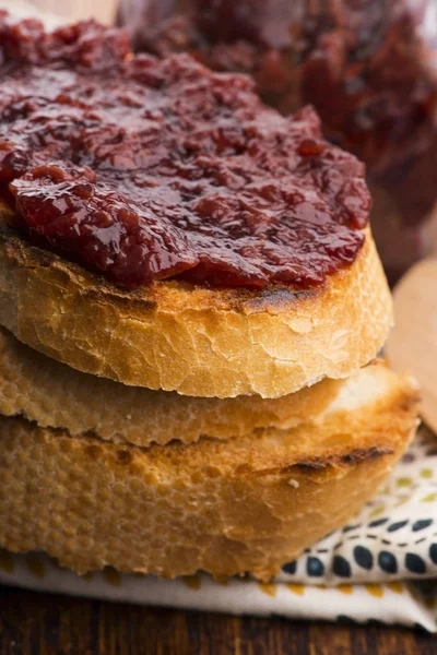 Bread with sweet cherry jam — Stock Photo, Image