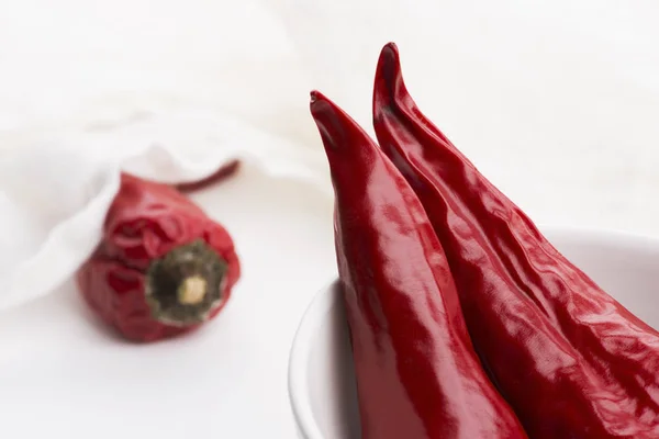 Bowl of red hot chili pepper on white background — Stock Photo, Image