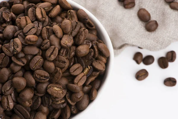 Bowl of caffee beans on a white background — Stock Photo, Image