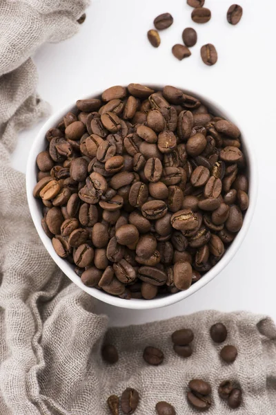 Bowl of caffee beans on a white background — Stock Photo, Image