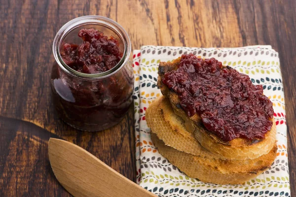 Bread with sweet cherry jam — Stock Photo, Image