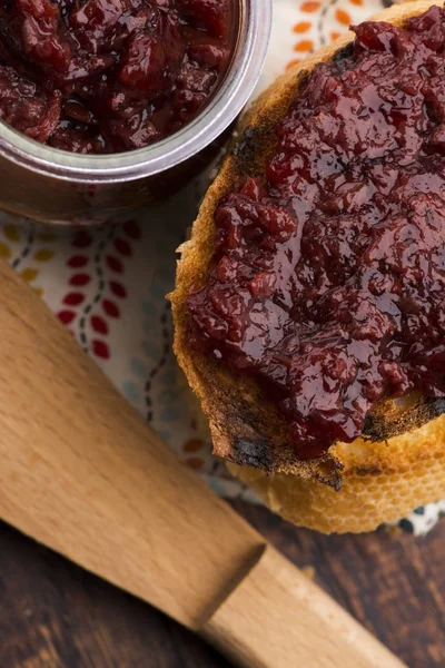 Bread with sweet cherry jam — Stock Photo, Image