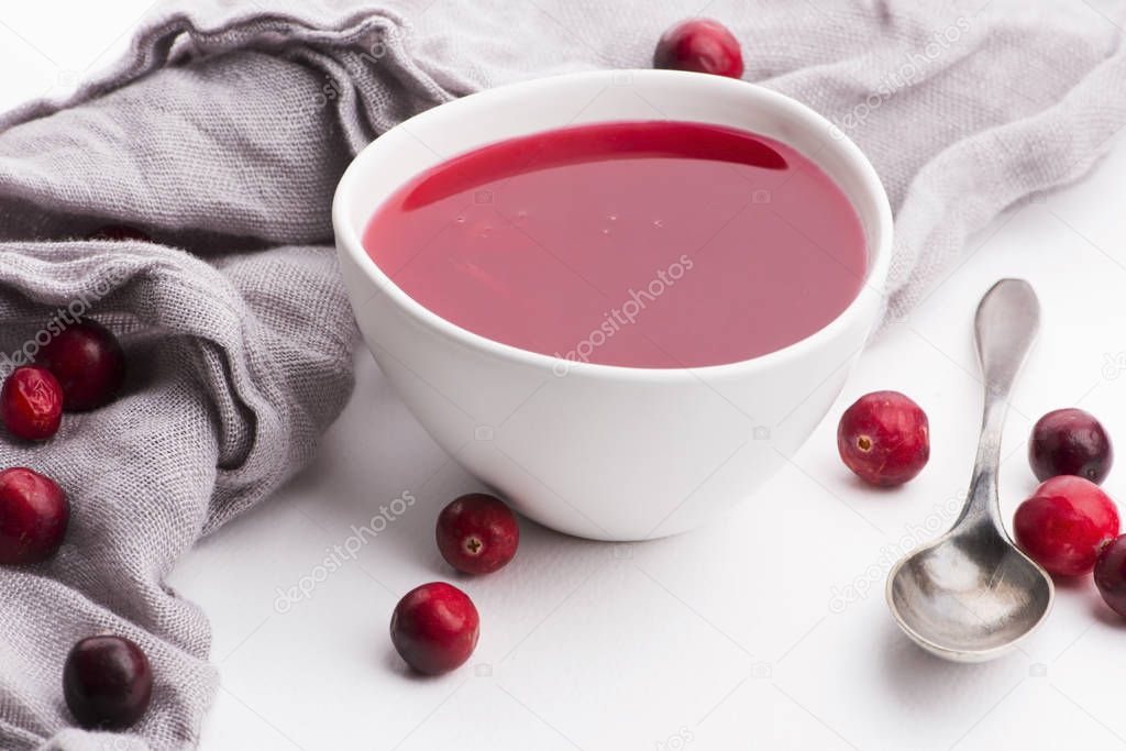 Bowl of Jelly with Cranberry on a white background